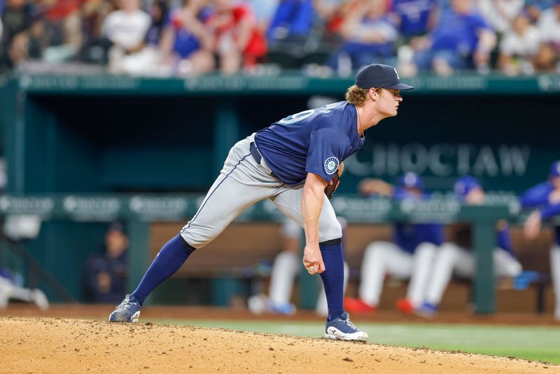 Sep 21, 2024; Arlington, Texas, USA; Seattle Mariners pitcher Troy Taylor (59) looks on for the sign during the sixth inning against the Texas Rangers at Globe Life Field. Mandatory Credit: Andrew Dieb-Imagn Images