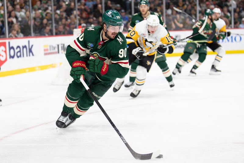 Feb 9, 2024; Saint Paul, Minnesota, USA; Minnesota Wild left wing Marcus Johansson (90) carries the puck out of the defensive zone against the Pittsburgh Penguins in the third period at Xcel Energy Center. Mandatory Credit: Matt Blewett-USA TODAY Sports