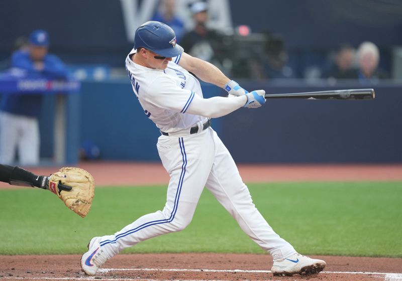 Jun 29, 2023; Toronto, Ontario, CAN; Toronto Blue Jays third baseman Matt Chapman (26) hits a single against the San Francisco Giants during the second inning at Rogers Centre. Mandatory Credit: Nick Turchiaro-USA TODAY Sports