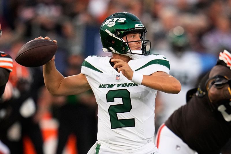 New York Jets quarterback Zach Wilson throws a pass during the first half of the NFL exhibition Hall of Fame football game against the Cleveland Browns, Thursday, Aug. 3, 2023, in Canton, Ohio. (AP Photo/Sue Ogrocki)