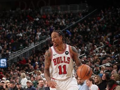 MILWAUKEE, WI - DECEMBER 11:  DeMar DeRozan #11 of the Chicago Bulls handles the ball during the game  on December 11, 2023 at the Fiserv Forum Center in Milwaukee, Wisconsin. NOTE TO USER: User expressly acknowledges and agrees that, by downloading and or using this Photograph, user is consenting to the terms and conditions of the Getty Images License Agreement. Mandatory Copyright Notice: Copyright 2023 NBAE (Photo by Gary Dineen/NBAE via Getty Images).