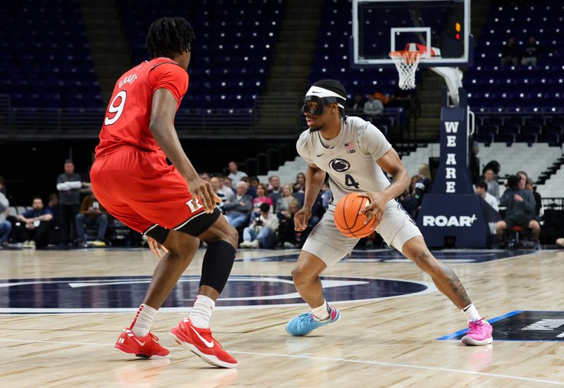 Feb 18, 2026; University Park, Pennsylvania, USA; Penn State Nittany Lions guard Kayden Mingo (4) dribbles the ball up the court as Rutgers Scarlet Knights forward Dylan Grant (9) defends during the first half at Bryce Jordan Center. Mandatory Credit: Matthew O'Haren-Imagn Images