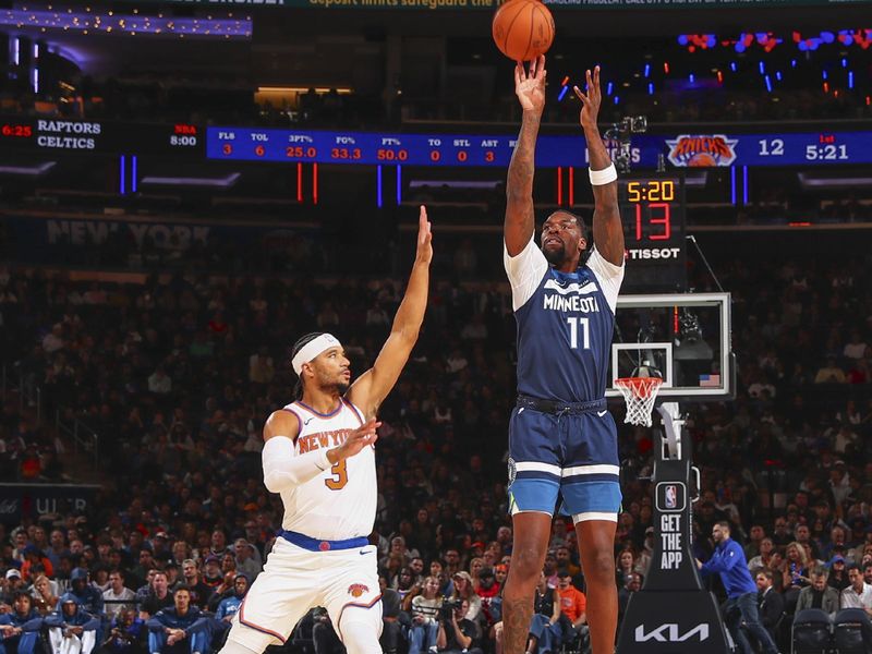 NEW YORK, NY - OCTOBER 13: Naz Reid #11 of the Minnesota Timberwolves shoots a three point basket during the game on October 13, 2024 at Madison Square Garden in New York City, New York.  NOTE TO USER: User expressly acknowledges and agrees that, by downloading and or using this photograph, User is consenting to the terms and conditions of the Getty Images License Agreement. Mandatory Copyright Notice: Copyright 2024 NBAE  (Photo by David L. Nemec/NBAE via Getty Images)