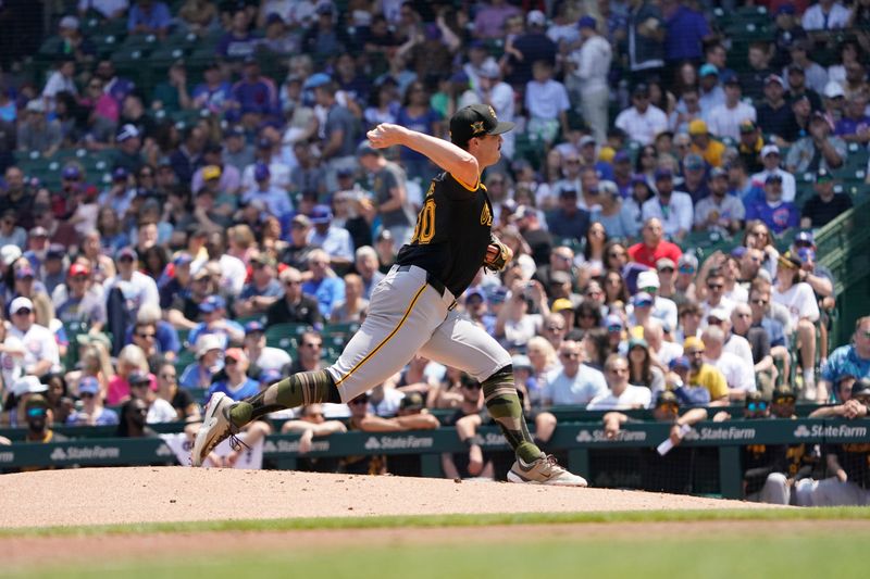 May 17, 2024; Chicago, Illinois, USA; Pittsburgh Pirates pitcher Paul Skenes (30) throws the ball against the Chicago Cubs during the first inning at Wrigley Field. Mandatory Credit: David Banks-USA TODAY Sports