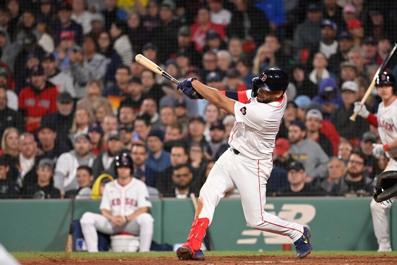 May 16, 2024; Boston, Massachusetts, USA;  Boston Red Sox first baseman Dominic Smith (2) hits a double against the Tampa Bay Rays  during the fifth inning at Fenway Park. Mandatory Credit: Eric Canha-USA TODAY Sports