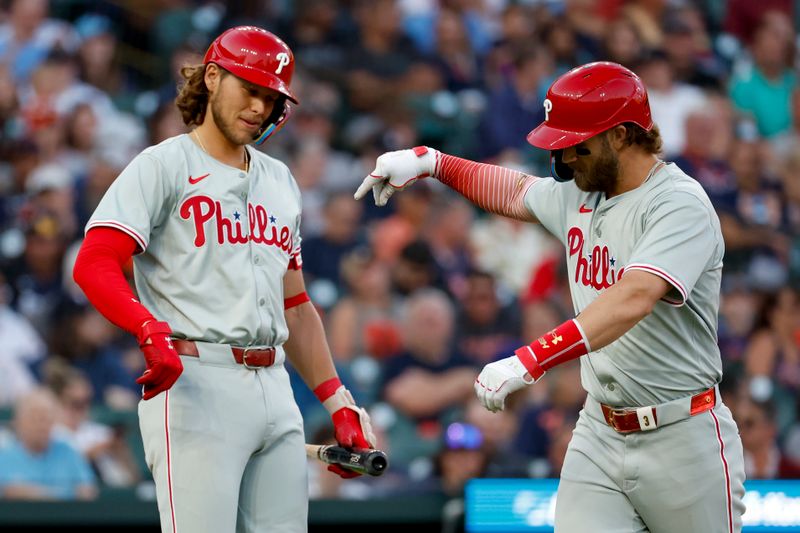 Jun 24, 2024; Detroit, Michigan, USA;  Philadelphia Phillies first baseman Bryce Harper (3) receives congratulations from third baseman Alec Bohm (28) after he hits a three-run home run in the sixth inning against the Detroit Tigers at Comerica Park. Mandatory Credit: Rick Osentoski-USA TODAY Sports