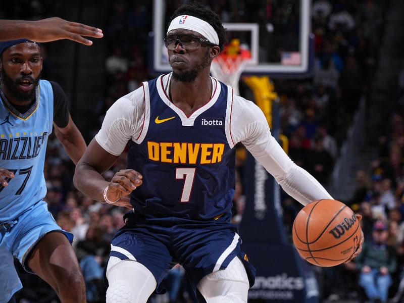 DENVER, CO - MARCH 25: Reggie Jackson #7 of the Denver Nuggets handles the ball during the game against the Memphis Grizzlies on March 25, 2024 at the Ball Arena in Denver, Colorado. NOTE TO USER: User expressly acknowledges and agrees that, by downloading and/or using this Photograph, user is consenting to the terms and conditions of the Getty Images License Agreement. Mandatory Copyright Notice: Copyright 2024 NBAE (Photo by Garrett Ellwood/NBAE via Getty Images)