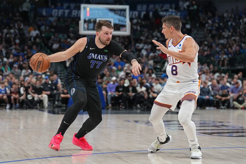 DALLAS, TX - FEBRUARY 22: Luka Doncic #77 of the Dallas Mavericks handles the ball during the game against the Phoenix Suns on February 22, 2024 at the American Airlines Center in Dallas, Texas. NOTE TO USER: User expressly acknowledges and agrees that, by downloading and or using this photograph, User is consenting to the terms and conditions of the Getty Images License Agreement. Mandatory Copyright Notice: Copyright 2024 NBAE (Photo by Glenn James/NBAE via Getty Images)