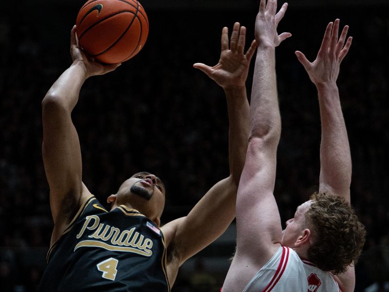 Mar 7, 2026; West Lafayette, Indiana, USA; Purdue Boilermakers forward Trey Kaufman-Renn (4) looks to shoot the ball as Wisconsin Badgers forward Austin Rapp (22) guards during the second half at Mackey Arena. Mandatory Credit: Jacob Musselman-Imagn Images Mar 7, 2026; West Lafayette, Indiana, USA; Purdue Boilermakers forward Trey Kaufman-Renn (4) looks to shoot the ball as Wisconsin Badgers forward Austin Rapp (22) guards during the second half at Mackey Arena. Mandatory Credit: Jacob Musselman-Imagn Images