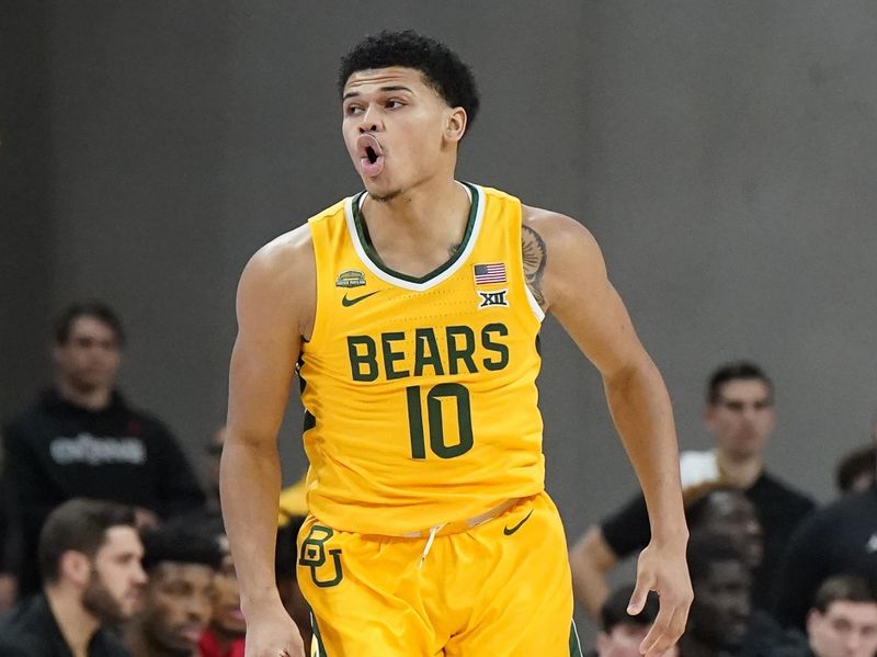 Jan 13, 2024; Waco, Texas, USA; Baylor Bears guard RayJ Dennis (10) reacts after a made basket against the Cincinnati Bearcats during the first half at Paul and Alejandra Foster Pavilion. Mandatory Credit: Raymond Carlin III-USA TODAY Sports