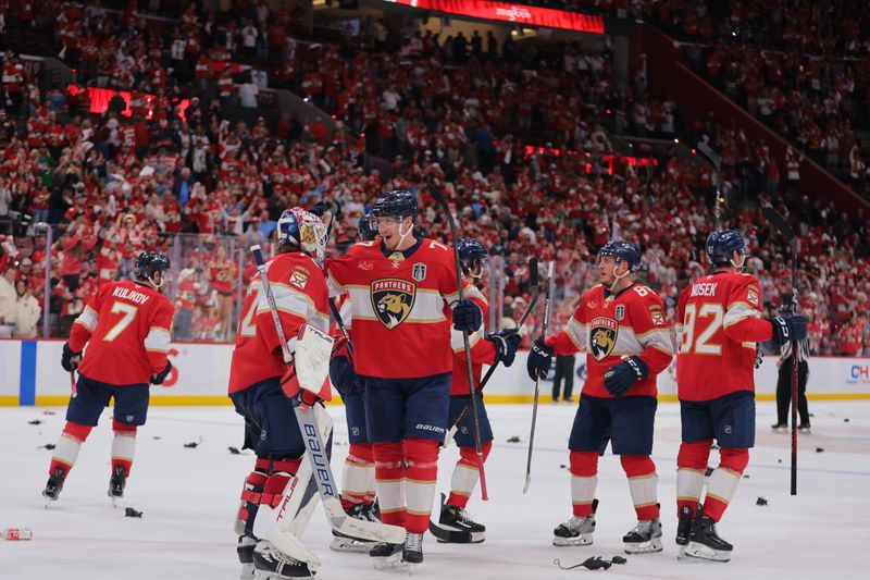 Jun 9, 2025; Sunrise, Florida, USA; Florida Panthers defenseman Niko Mikkola (77) celebrates with goaltender Sergei Bobrovsky (72) after the third period in game three of the 2025 Stanley Cup Final at Amerant Bank Arena. Mandatory Credit: Sam Navarro-Imagn Images