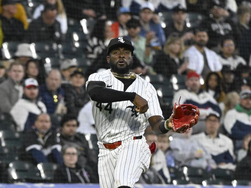 May 11, 2024; Chicago, Illinois, USA;  Chicago White Sox third base Bryan Ramos (44) throws to retire Cleveland Guardians outfielder Ramón Laureano (not pictured) during the seventh inning at Guaranteed Rate Field. Mandatory Credit: Matt Marton-USA TODAY Sports