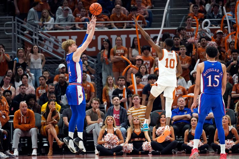 Mar 4, 2023; Austin, Texas, USA; Kansas Jayhawks guard Gradey Dick (4) shoots over Texas Longhorns guard Sir'Jabari Rice (10) during the first half at Moody Center. Mandatory Credit: Scott Wachter-USA TODAY Sports