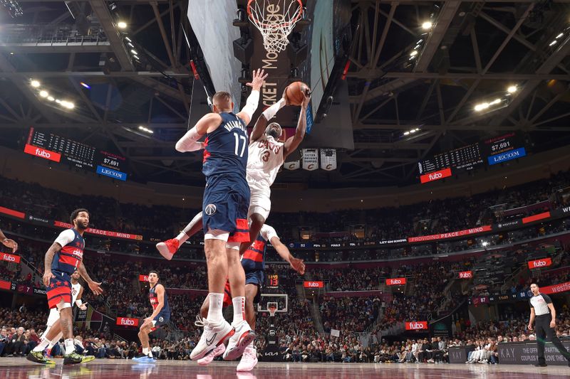 CLEVELAND, OH - DECEMBER 13: Caris LeVert #3 of the Cleveland Cavaliers drives to the basket during the game against the Washington Wizards on December 13, 2024 at Rocket Mortgage FieldHouse in Cleveland, Ohio. NOTE TO USER: User expressly acknowledges and agrees that, by downloading and/or using this Photograph, user is consenting to the terms and conditions of the Getty Images License Agreement. Mandatory Copyright Notice: Copyright 2024 NBAE (Photo by David Liam Kyle/NBAE via Getty Images)