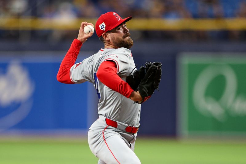 Apr 15, 2024; St. Petersburg, Florida, USA;  Los Angeles Angels pitcher Matt Moore throws a pitch against the Tampa Bay Rays in the eighth inning during Jackie Robinson day at Tropicana Field. Mandatory Credit: Nathan Ray Seebeck-USA TODAY Sports