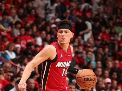 MIAMI, FL - DECEMBER 25:  Tyler Herro #14 of the Miami Heat handles the ball during the game  on December 25, 2023 at Kaseya Center Arena in Miami, Florida. NOTE TO USER: User expressly acknowledges and agrees that, by downloading and or using this Photograph, user is consenting to the terms and conditions of the Getty Images License Agreement. Mandatory Copyright Notice: Copyright 2023 NBAE (Photo by Issac Baldizon/NBAE via Getty Images)