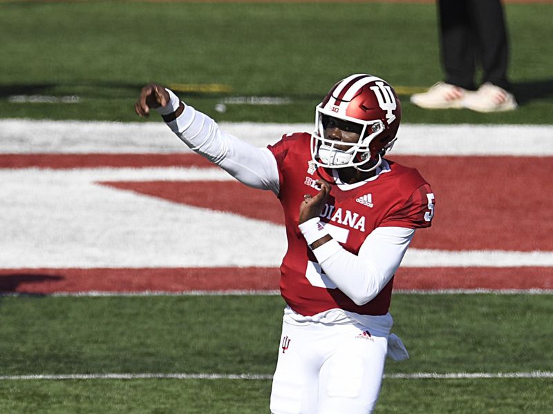 Oct 24, 2020; Bloomington, Indiana, USA; Indiana Hoosiers quarterback Dexter Williams II (5) warms up before the game against the Penn State Nittany Lions. Mandatory Credit: Marc Lebryk-USA TODAY Sports