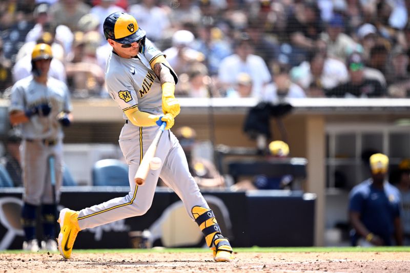 Jun 23, 2024; San Diego, California, USA; Milwaukee Brewers third baseman Joey Ortiz (3) hits a single against the San Diego Padres during the eighth inning at Petco Park. Mandatory Credit: Orlando Ramirez-USA TODAY Sports