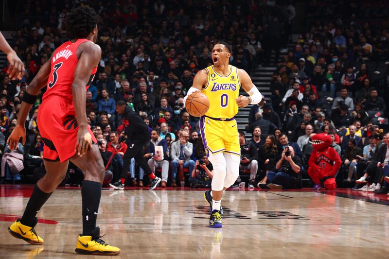 TORONTO, CANADA - DECEMBER 7:  Russell Westbrook #0 of the Los Angeles Lakers reacts during the game against the Toronto Raptors on December 7, 2022 at the Scotiabank Arena in Toronto, Ontario, Canada.  NOTE TO USER: User expressly acknowledges and agrees that, by downloading and or using this Photograph, user is consenting to the terms and conditions of the Getty Images License Agreement.  Mandatory Copyright Notice: Copyright 2022 NBAE (Photo by Vaughn Ridley/NBAE via Getty Images)