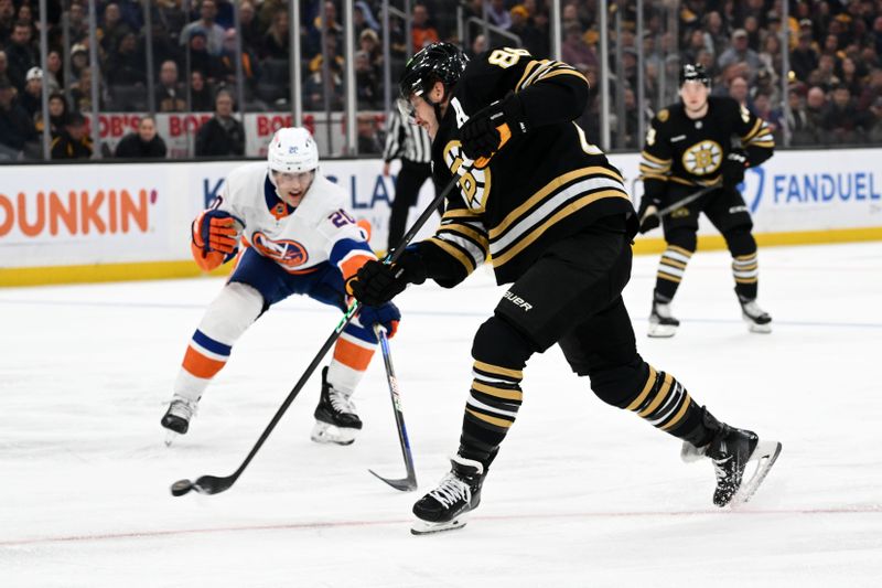 Nov 9, 2023; Boston, Massachusetts, USA; Boston Bruins right wing David Pastrnak (88) attempts a shot in front of New York Islanders right wing Hudson Fasching (20) during the first period at the TD Garden. Mandatory Credit: Brian Fluharty-USA TODAY Sports