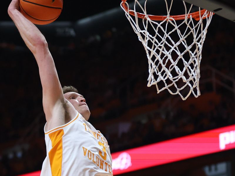 Jan 20, 2024; Knoxville, Tennessee, USA; Tennessee Volunteers guard Dalton Knecht (3) dunks the ball against the Alabama Crimson Tide during the second half at Thompson-Boling Arena at Food City Center. Mandatory Credit: Randy Sartin-USA TODAY Sports