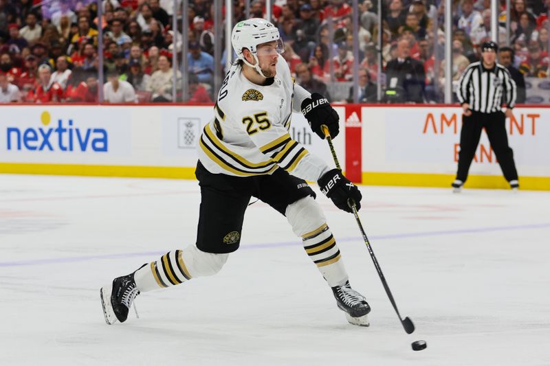 May 8, 2024; Sunrise, Florida, USA; Boston Bruins defenseman Brandon Carlo (25) shoots the puck against the Florida Panthers during the second period in game two of the second round of the 2024 Stanley Cup Playoffs at Amerant Bank Arena. Mandatory Credit: Sam Navarro-USA TODAY Sports