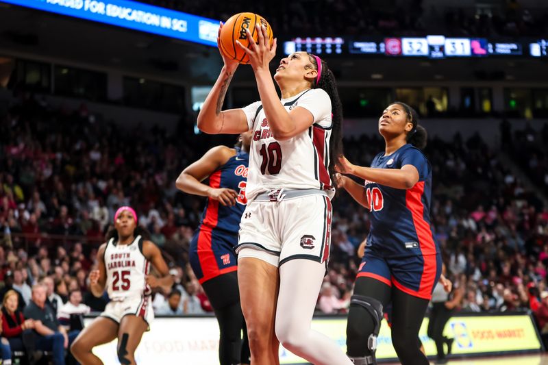 Feb 4, 2024; Columbia, South Carolina, USA; South Carolina Gamecocks center Kamilla Cardoso (10) drives against the Ole Miss Rebels in the first half at Colonial Life Arena. Mandatory Credit: Jeff Blake-USA TODAY Sports