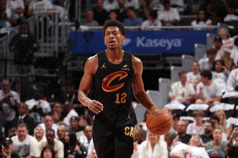 MIAMI, FL - APRIL 28:  De'Andre Hunter #12 of the Cleveland Cavaliers handles the ball during the game against the Miami Heat during Round 1 Game 4 on April 28, 2025 at Kaseya Center in Miami, Florida. NOTE TO USER: User expressly acknowledges and agrees that, by downloading and or using this Photograph, user is consenting to the terms and conditions of the Getty Images License Agreement. Mandatory Copyright Notice: Copyright 2025 NBAE (Photo by Issac Baldizon/NBAE via Getty Images)