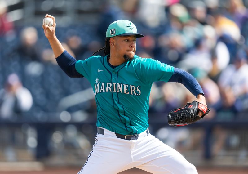 Mar 3, 2025; Peoria, Arizona, USA; Seattle Mariners pitcher Luis Castillo against the Cleveland Guardians during a spring training game at Peoria Sports Complex. Mandatory Credit: Mark J. Rebilas-Imagn Images