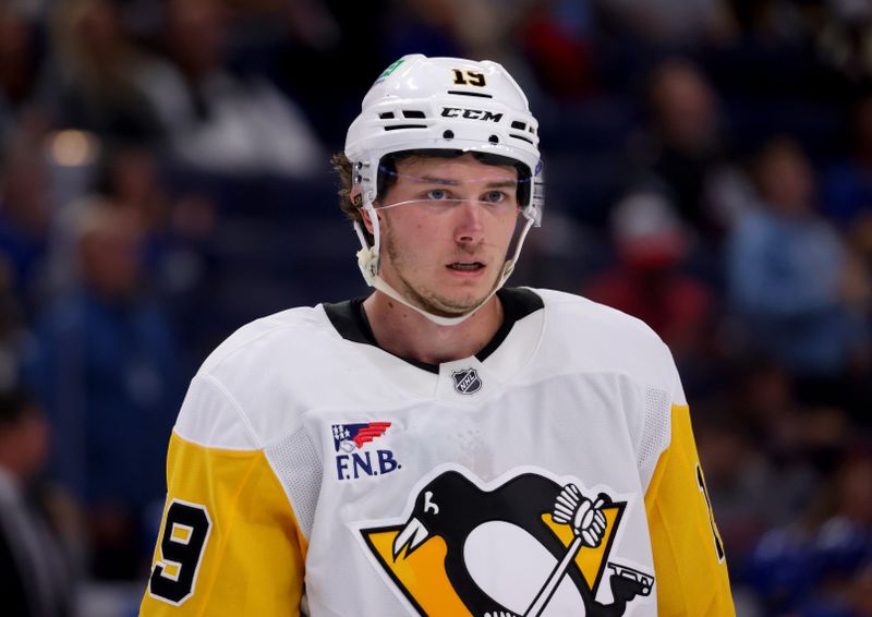 Sep 21, 2024; Buffalo, New York, USA;  Pittsburgh Penguins center Cody Glass (19) waits for the face-off during the third period against the Buffalo Sabres at KeyBank Center. Mandatory Credit: Timothy T. Ludwig-Imagn Images