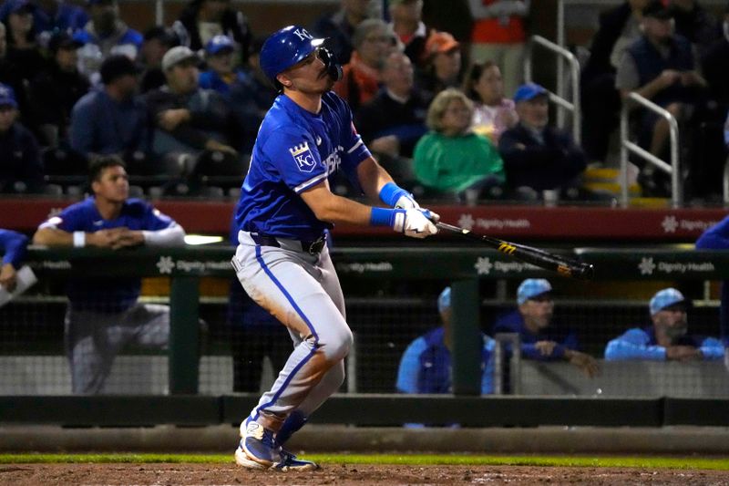 Mar 19, 2024; Scottsdale, Arizona, USA; Kansas City Royals shortstop Nick Loftin (12) hits a two run home run against the San Francisco Giants in the third inning at Scottsdale Stadium. Mandatory Credit: Rick Scuteri-USA TODAY Sports