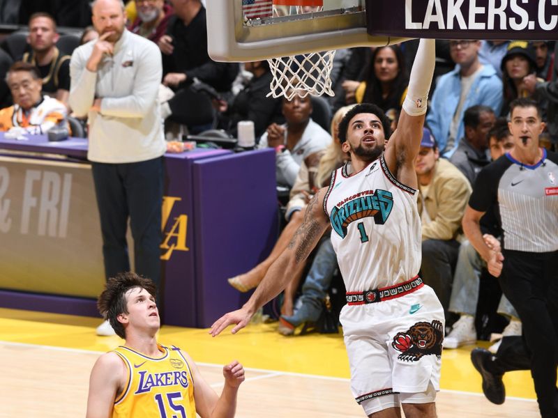 LOS ANGELES, CA - NOVEMBER 13: Scotty Pippen Jr. #1 of the Memphis Grizzlies drives to the basket during the game against the Los Angeles Lakers on November 13, 2024 at Crypto.Com Arena in Los Angeles, California. NOTE TO USER: User expressly acknowledges and agrees that, by downloading and/or using this Photograph, user is consenting to the terms and conditions of the Getty Images License Agreement. Mandatory Copyright Notice: Copyright 2024 NBAE (Photo by Adam Pantozzi/NBAE via Getty Images)