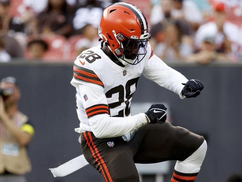 Cleveland Browns linebacker Jeremiah Owusu-Koramoah (28) reacts after making a defensive stop during an NFL preseason football game against the Chicago Bears, Saturday Aug. 27, 2022, in Cleveland. (AP Photo/Kirk Irwin)