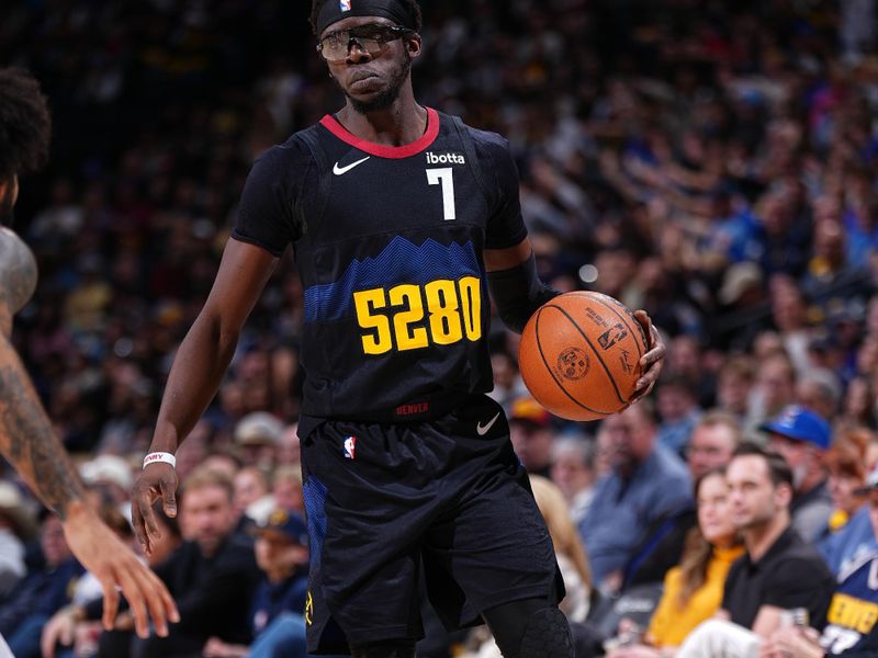 DENVER, CO - JANUARY 7: Reggie Jackson #7 of the Denver Nuggets dribbles the ball during the game against the Detroit Pistons on January 7, 2024 at the Ball Arena in Denver, Colorado. NOTE TO USER: User expressly acknowledges and agrees that, by downloading and/or using this Photograph, user is consenting to the terms and conditions of the Getty Images License Agreement. Mandatory Copyright Notice: Copyright 2024 NBAE (Photo by Garrett Ellwood/NBAE via Getty Images)