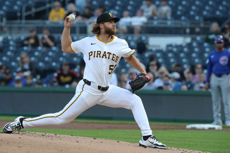 Apr 30, 2025; Pittsburgh, Pennsylvania, USA;  Pittsburgh Pirates starting pitcher Carmen Mlodzinski (50) delivers a pitch against the Chicago Cubs during the first inning at PNC Park. Mandatory Credit: Charles LeClaire-Imagn Images