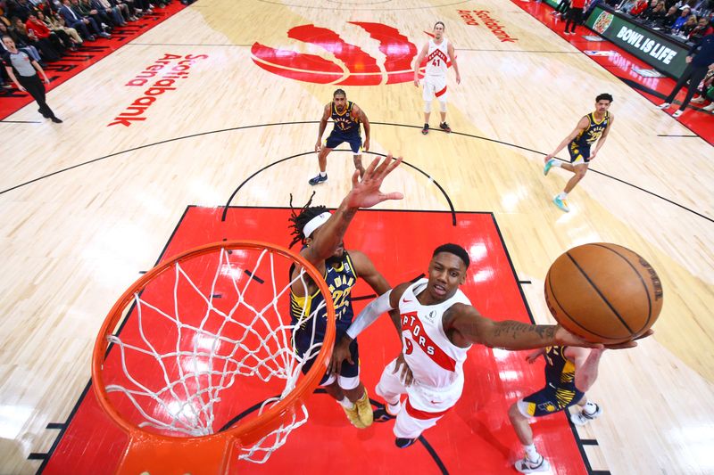 TORONTO, CANADA - APRIL 9:  RJ Barrett #9 of the Toronto Raptors goes to the basket during the game on April 9, 2024 at the Scotiabank Arena in Toronto, Ontario, Canada.  NOTE TO USER: User expressly acknowledges and agrees that, by downloading and or using this Photograph, user is consenting to the terms and conditions of the Getty Images License Agreement.  Mandatory Copyright Notice: Copyright 2024 NBAE (Photo by Vaughn Ridley/NBAE via Getty Images)