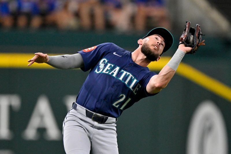 Jun 28, 2025; Arlington, Texas, USA; Seattle Mariners third baseman Miles Mastrobuoni (21) catches a pop fly hit by Texas Rangers left fielder Alejandro Osuna (not pictured) during the fourth inning at Globe Life Field. Mandatory Credit: Jerome Miron-Imagn Images