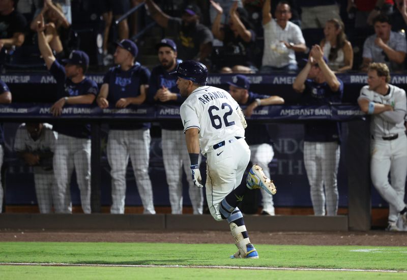 May 20, 2025; St. Petersburg, Florida, USA; Tampa Bay Rays first base Jonathan Aranda (62) hits a two-run single duding the eighth inning against the Houston Astros at George M. Steinbrenner Field. Mandatory Credit: Kim Klement Neitzel-Imagn Images
