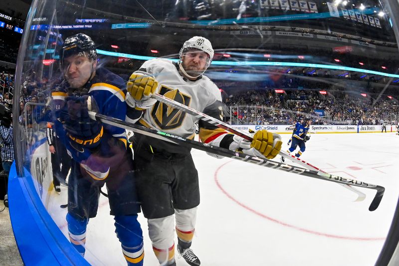 Mar 25, 2024; St. Louis, Missouri, USA;  Vegas Golden Knights right wing Anthony Mantha (39) checks St. Louis Blues defenseman Colton Parayko (55) during the third period at Enterprise Center. Mandatory Credit: Jeff Curry-USA TODAY Sports