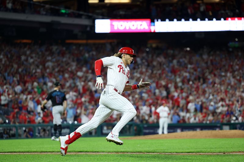 Oct 4, 2023; Philadelphia, Pennsylvania, USA; Philadelphia Phillies first baseman Alec Bohm (28) runs toward second base after hitting a double against the Miami Marlins during the sixth inning for game two of the Wildcard series for the 2023 MLB playoffs at Citizens Bank Park. Mandatory Credit: Bill Streicher-USA TODAY Sports