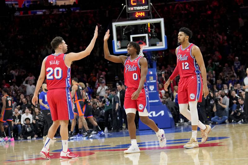 PHILADELPHIA, PA - FEBRUARY 10: Tyrese Maxey #0 of the Philadelphia 76ers high fives Georges Niang #20 of the Philadelphia 76ers during the game against the New York Knicks on February 10, 2023 at the Wells Fargo Center in Philadelphia, Pennsylvania NOTE TO USER: User expressly acknowledges and agrees that, by downloading and/or using this Photograph, user is consenting to the terms and conditions of the Getty Images License Agreement. Mandatory Copyright Notice: Copyright 2023 NBAE (Photo by Jesse D. Garrabrant/NBAE via Getty Images)