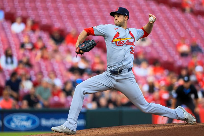 Apr 30, 2025; Cincinnati, Ohio, USA; St. Louis Cardinals starting pitcher Steven Matz (32) pitches against the Cincinnati Reds in the first inning at Great American Ball Park. Mandatory Credit: Katie Stratman-Imagn Images