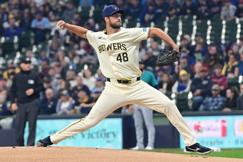 Apr 7, 2024; Milwaukee, Wisconsin, USA;  Milwaukee Brewers pitcher Colin Rea (48) throws a pitch in the first inning against the Seattle Mariners at American Family Field. Mandatory Credit: Benny Sieu-USA TODAY Sports