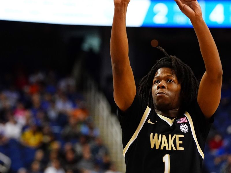 Mar 9, 2023; Greensboro, NC, USA; Wake Forest Demon Deacons guard Tyree Appleby (1) takes a shot against the Miami (Fl) Hurricanes during the second half of the quarterfinals of the ACC tournament at Greensboro Coliseum. Mandatory Credit: John David Mercer-USA TODAY Sports