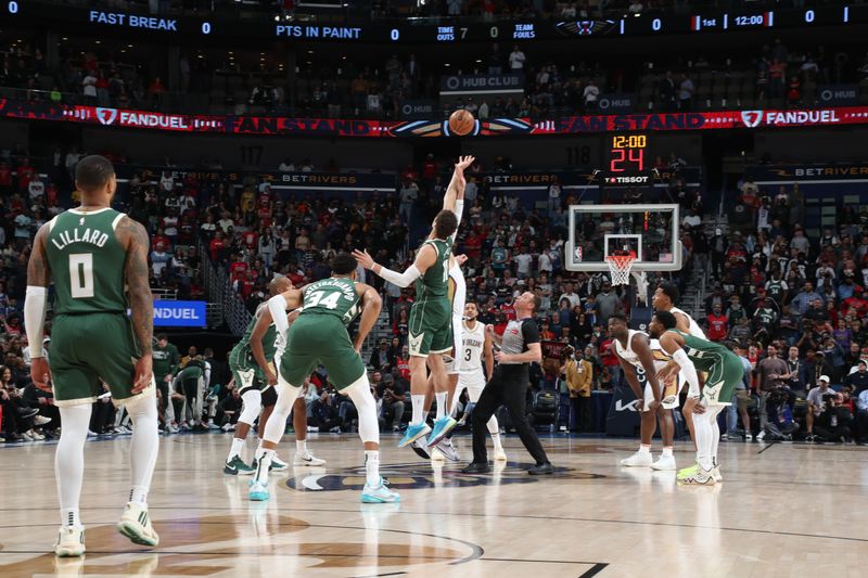 NEW ORLEANS, LA - MARCH 28: Open tip-off between Brook Lopez #11 of the Milwaukee Bucks & Jonas Valanciunas #17 of the New Orleans Pelicans on March 28, 2024 at the Smoothie King Center in New Orleans, Louisiana. NOTE TO USER: User expressly acknowledges and agrees that, by downloading and or using this Photograph, user is consenting to the terms and conditions of the Getty Images License Agreement. Mandatory Copyright Notice: Copyright 2024 NBAE (Photo by Layne Murdoch Jr./NBAE via Getty Images)
