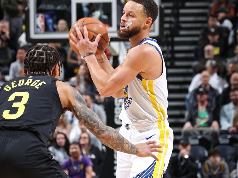 SALT LAKE CITY, UT - FEBRUARY 12: Stephen Curry #30 of the Golden State Warriors handles the ball during the game against the Utah Jazz on February 12, 2024 at Delta Center in Salt Lake City, Utah. NOTE TO USER: User expressly acknowledges and agrees that, by downloading and or using this Photograph, User is consenting to the terms and conditions of the Getty Images License Agreement. Mandatory Copyright Notice: Copyright 2024 NBAE (Photo by Melissa Majchrzak/NBAE via Getty Images)