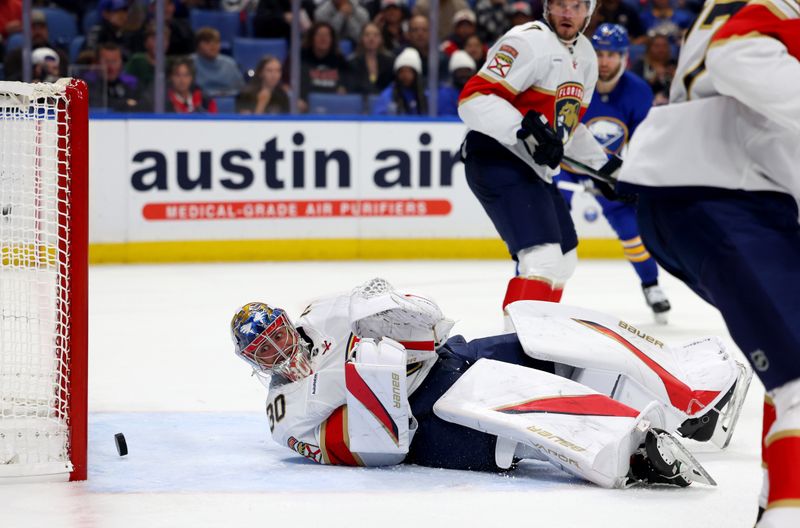 Oct 12, 2024; Buffalo, New York, USA;  Florida Panthers goaltender Spencer Knight (30) watches the puck go in the net on a shot by Buffalo Sabres defenseman Mattias Samuelsson (not pictured) during the second period at KeyBank Center. Mandatory Credit: Timothy T. Ludwig-Imagn Images