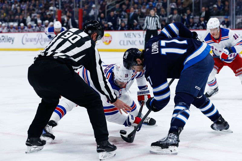 Mar 11, 2025; Winnipeg, Manitoba, CAN;  Winnipeg Jets forward Adam Lowry (17) faces-off against New York Rangers forward Vincent Trocheck (16) during the first period at Canada Life Centre. Mandatory Credit: Terrence Lee-Imagn Images