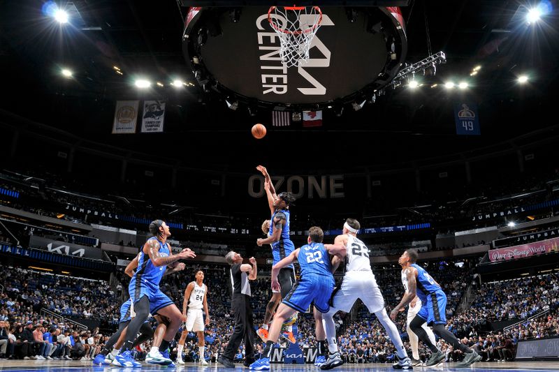 ORLANDO, FL - FEBRUARY 8: Jump ball during the game between the San Antonio Spurs and the Orlando Magic on February 8, 2024 at the Kia Center in Orlando, Florida. NOTE TO USER: User expressly acknowledges and agrees that, by downloading and or using this photograph, User is consenting to the terms and conditions of the Getty Images License Agreement. Mandatory Copyright Notice: Copyright 2024 NBAE (Photo by Fernando Medina/NBAE via Getty Images)