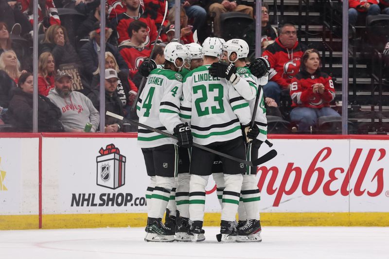 Dec 3, 2025; Newark, New Jersey, USA; Dallas Stars left wing Jason Robertson (21) celebrates his goal against the New Jersey Devils during the second period at Prudential Center. Mandatory Credit: Ed Mulholland-Imagn Images